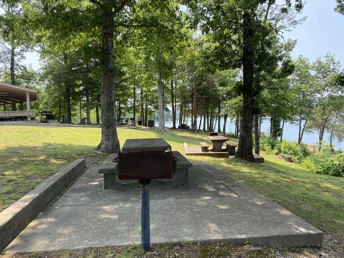 A photo of facility CUMBERLAND POINT CAMPGROUND with Picnic Table, grill for day use picnics.