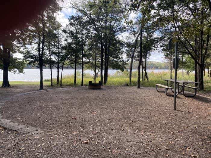 A lakeside campsite in Buckhorn Campground at Chickasaw National Recreation Area