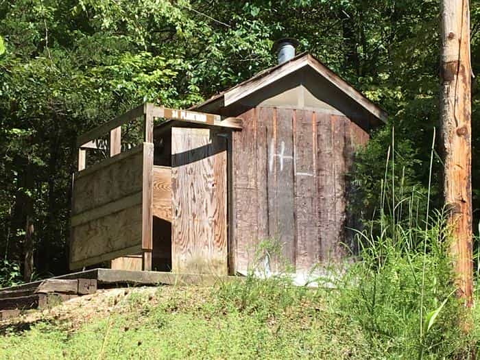 SITE # 34 PLANKYARD VAULT TOILET