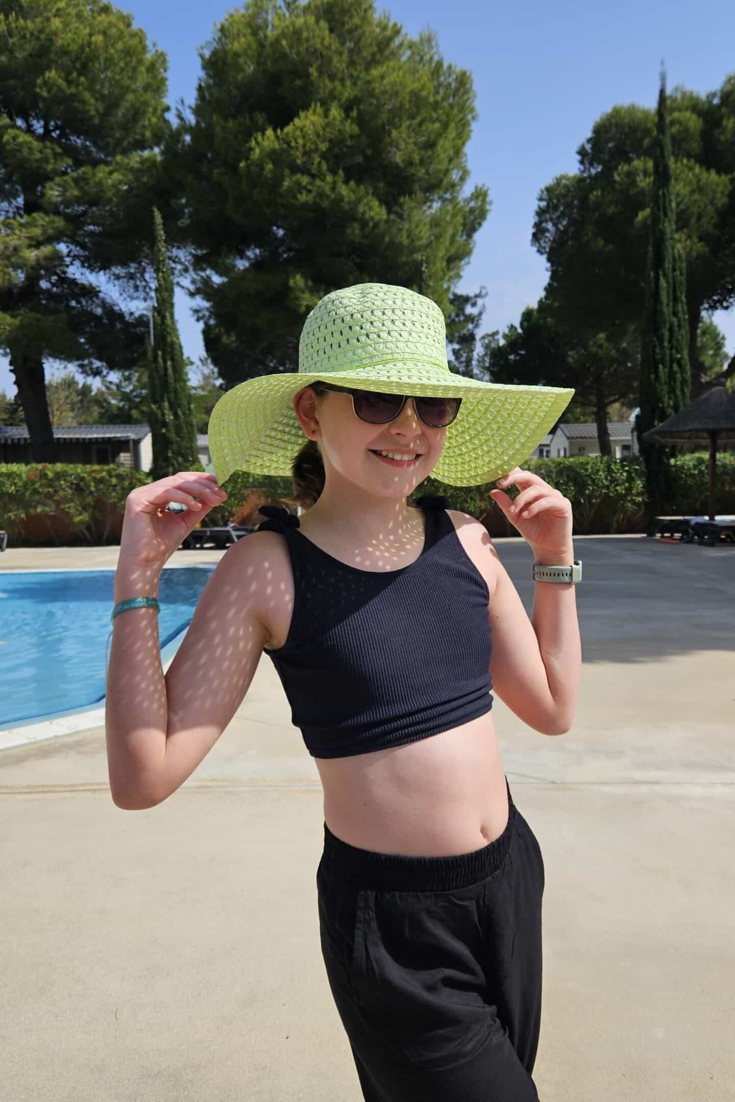 Chloe by the pool at Camping Les Tropiques