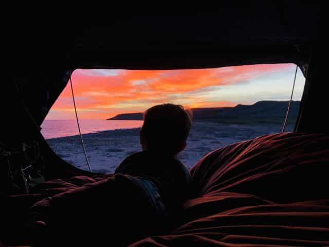 Three-year-old Caspian, looking out on Punta Chivato at sunrise