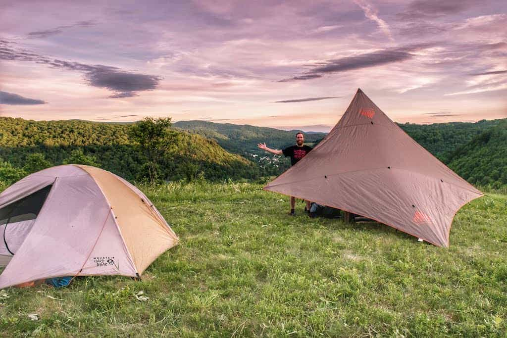 Our tent and kitchen tarp in a Vermont field