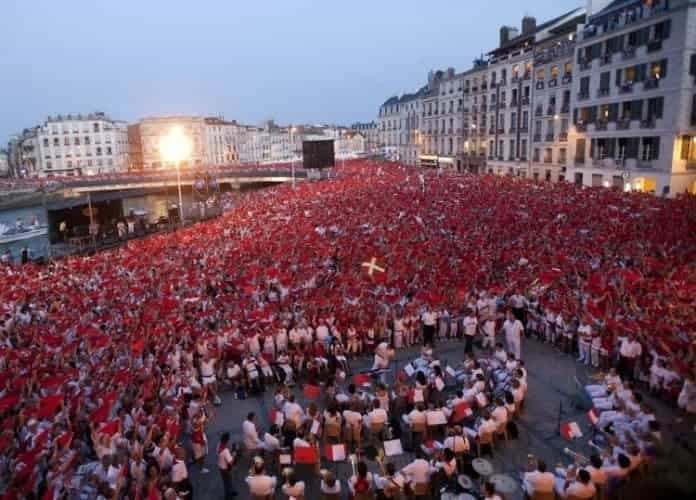 Revelers in the streets celebrate the Fetes de Bayonne in France.